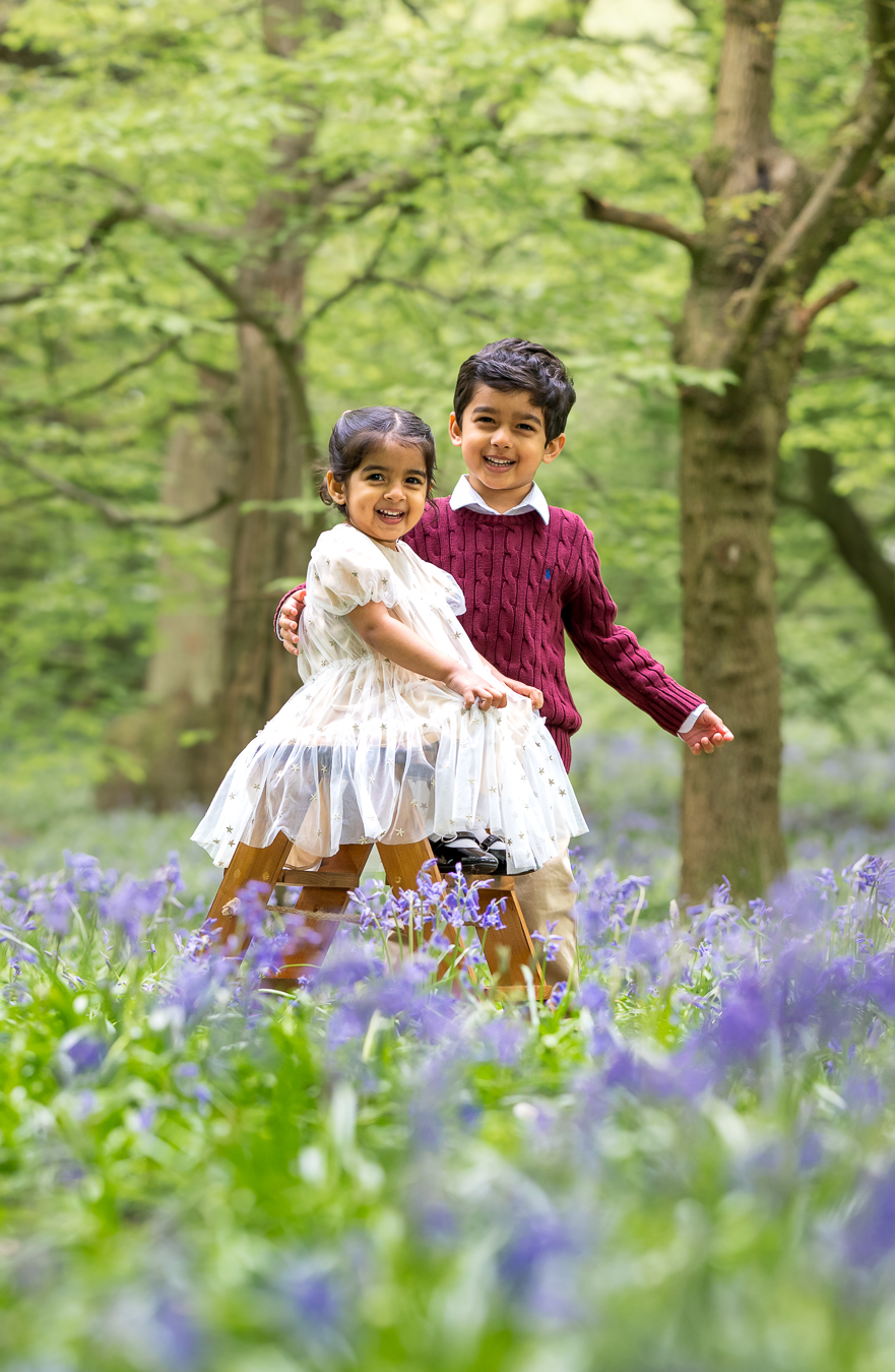 Family in bluebell woodland, Ware Hertfordshire, by Mike Silver Photography