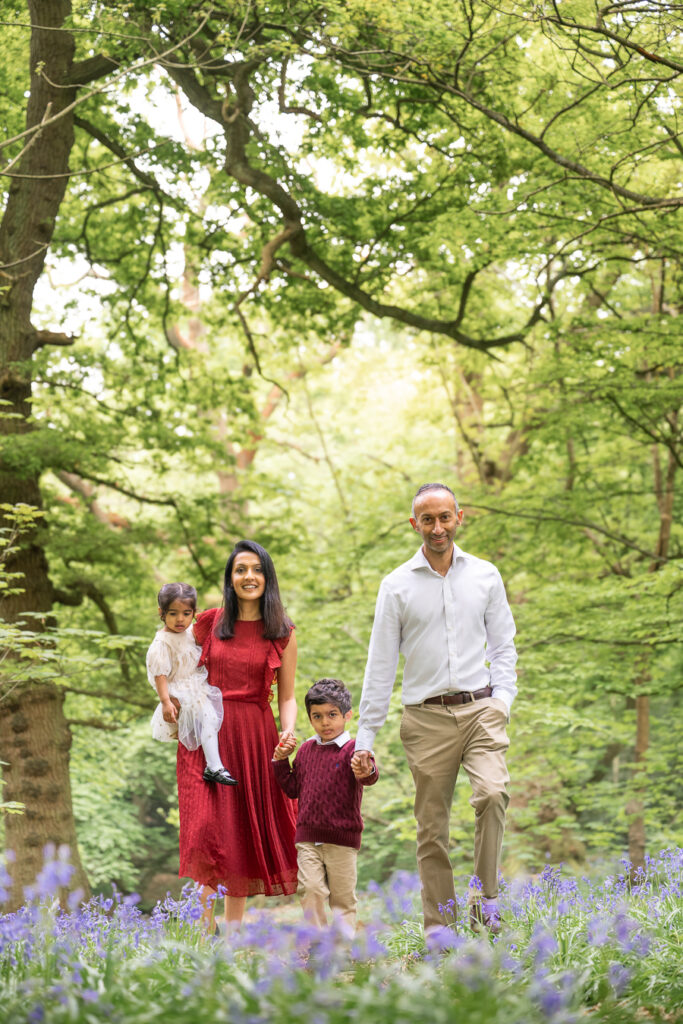 Family walking through the woods