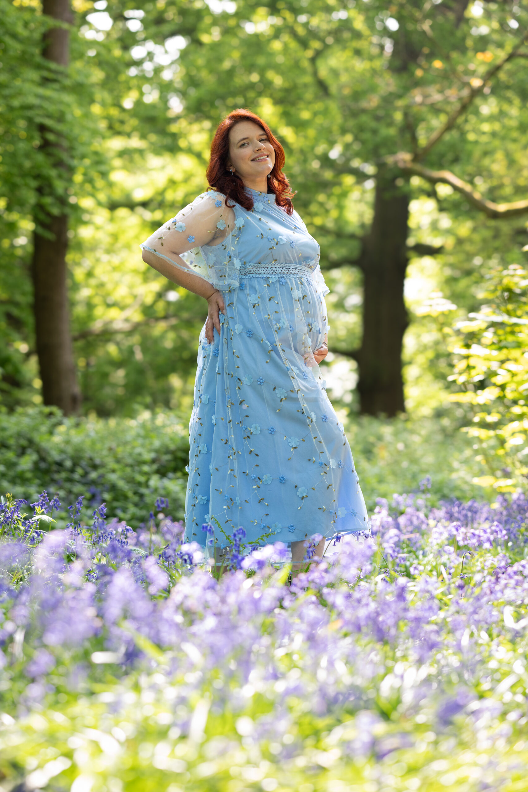 Family in bluebell woodland, Ware Hertfordshire, by Mike Silver Photography