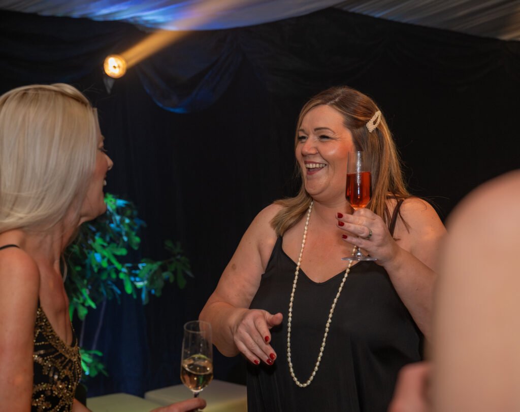 Lady laughing at a party