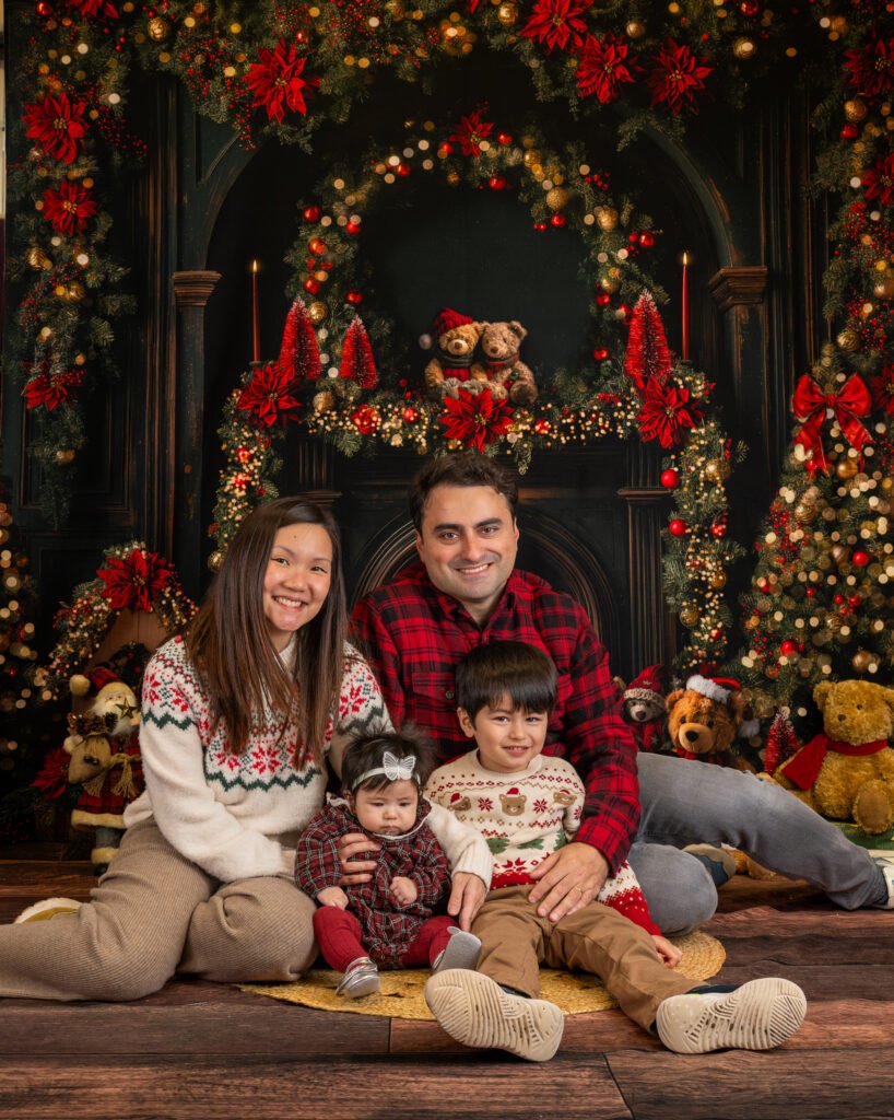 Family relaxing at the fireplace together