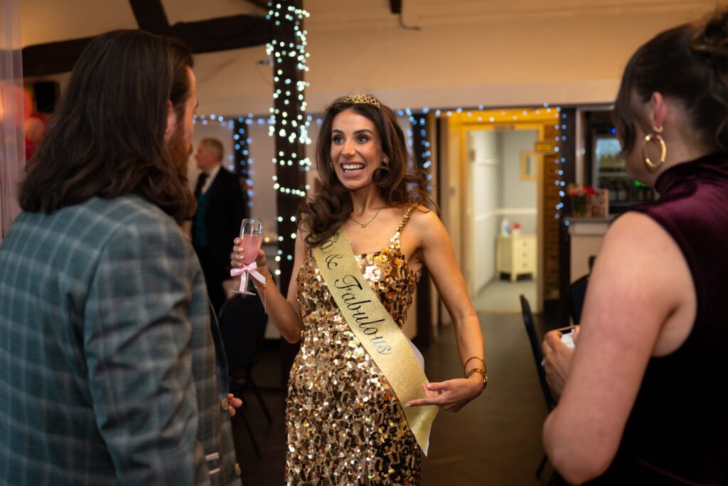 Woman wearing a birthday sash